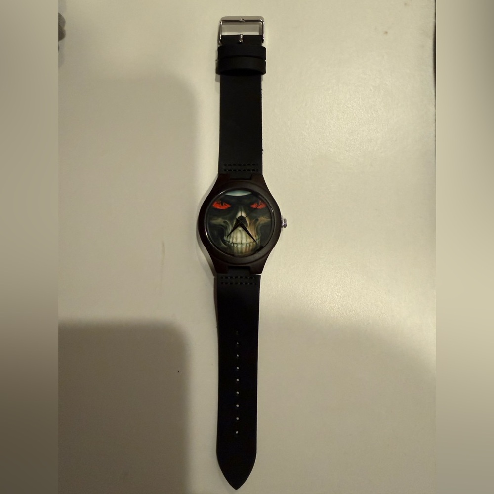 Black Smartwatch with Skull Face